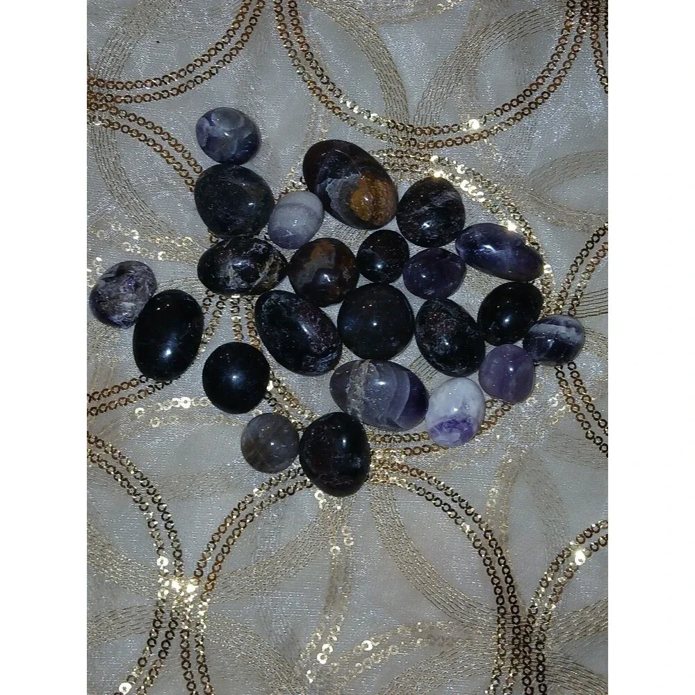 Assorted Polished Amethyst and Garnet in Astrophyllite Tumbled Stones